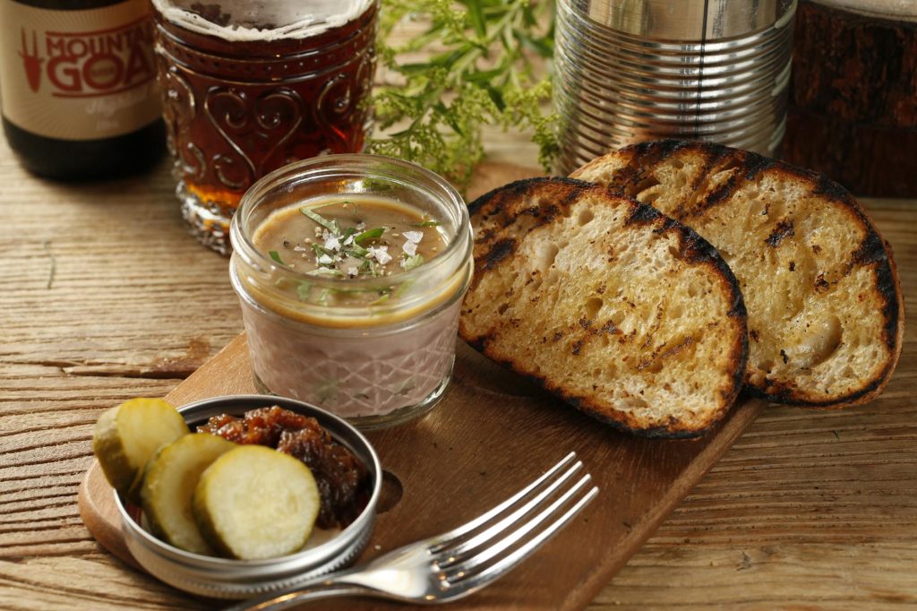 close up photograph of toasted bread with pate